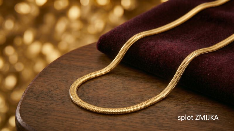 Smooth gold snake chain with a dense weave resembling the shiny surface of a snake.